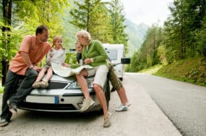 Travel - family with camping car on the road